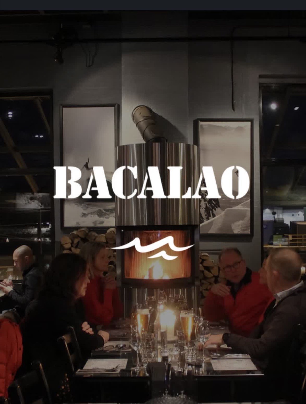 Bacalao restaurant branding on a wall-mounted fireplace in Lofoten
