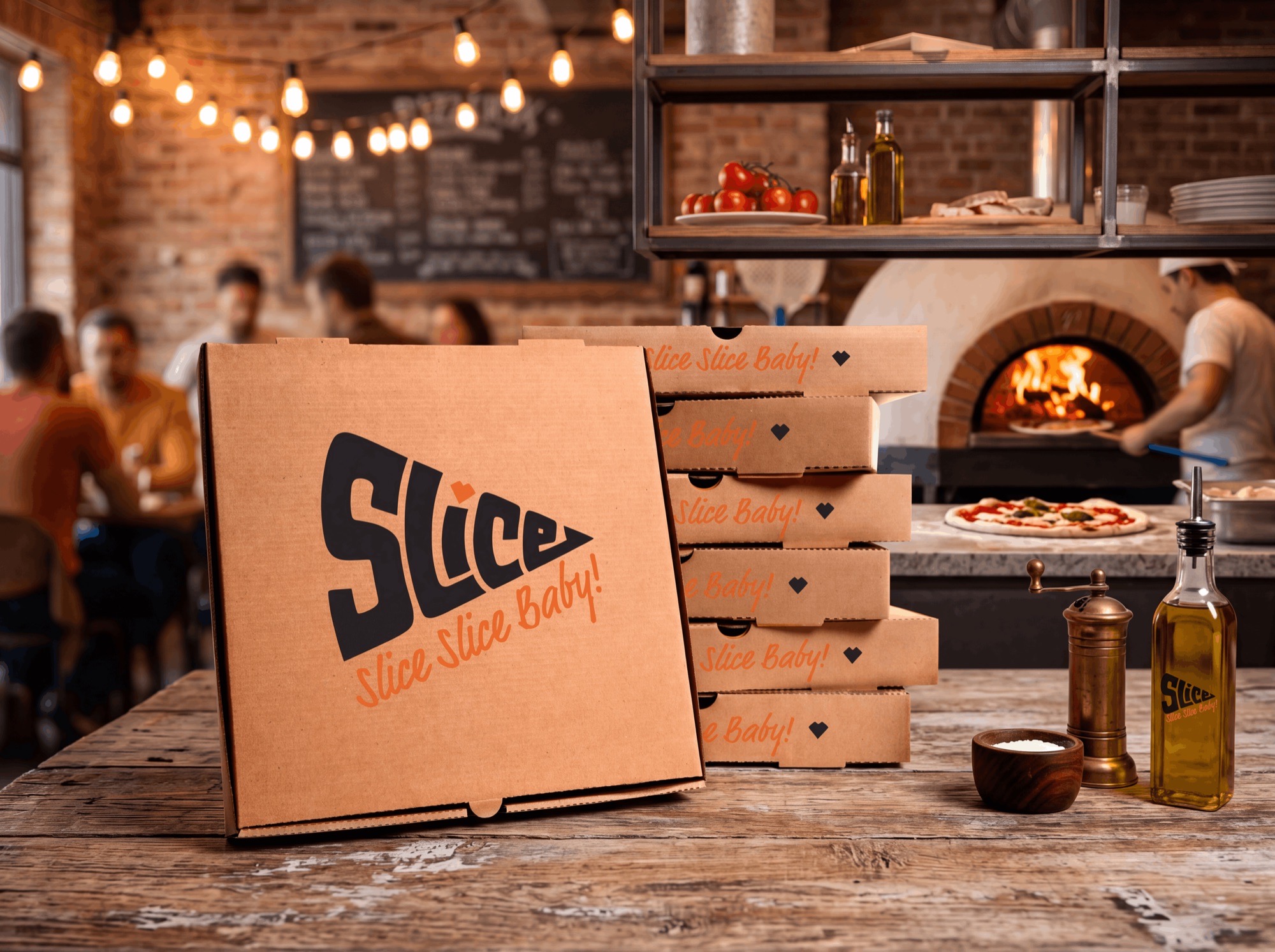 Slice pizza box branding on a restaurant counter